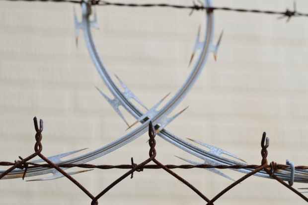 barbed wire barrier blur border